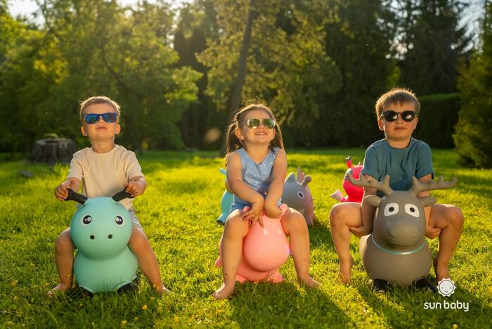 SUN BABY Gumijas lēcējs bērniem ZIEMEĻBRIEDIS