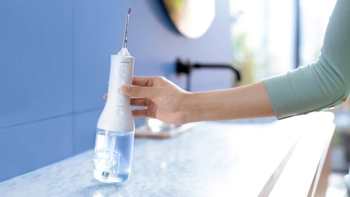 Philips Sonicare Cordless Power Flosser DiamondClean 9000 Набор из электрической зубной щетки и ирригатора (HX3886/41)