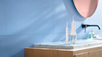 Philips Sonicare Cordless Power Flosser DiamondClean 9000 Набор из электрической зубной щетки и ирригатора (HX3886/41)
