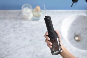Sonicare Cordless Power Flosser 3000 mutes dobuma irrigators, melns (HX3826/33)