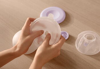 Philips Avent Natural Care dubultais brīvroku valkājamais krūts piena sūknis (uzlādējams) (SCF495/11)