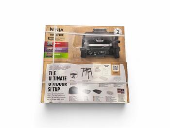 Prece ar Bojātu iepakojumu- Ninja Woodfire Pro XL elektriskais āra grils, melns (OG850EU-B)