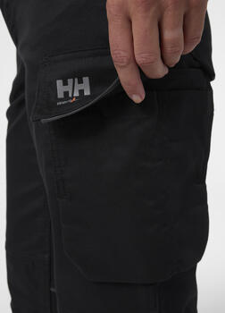 Helly Hansen Sieviešu darba bikses Manchester Work 77529_990-C42, C42, melns, 2 virzienu elastīgs, atstarojoši elementi (77529_990-C42)